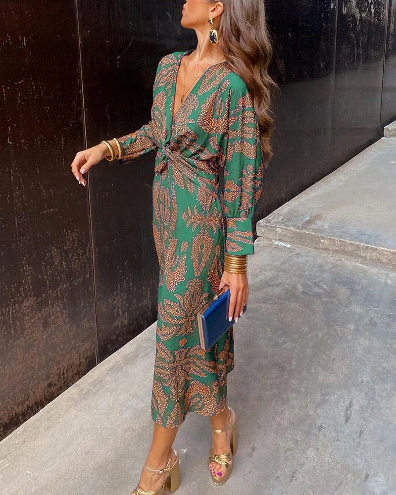 Dineke - Elegant dress with long sleeves and floral print